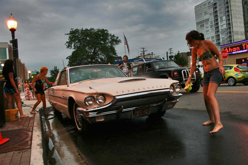Illustration for article titled Noir Leather Bikini Car Wash Meetup Pictures